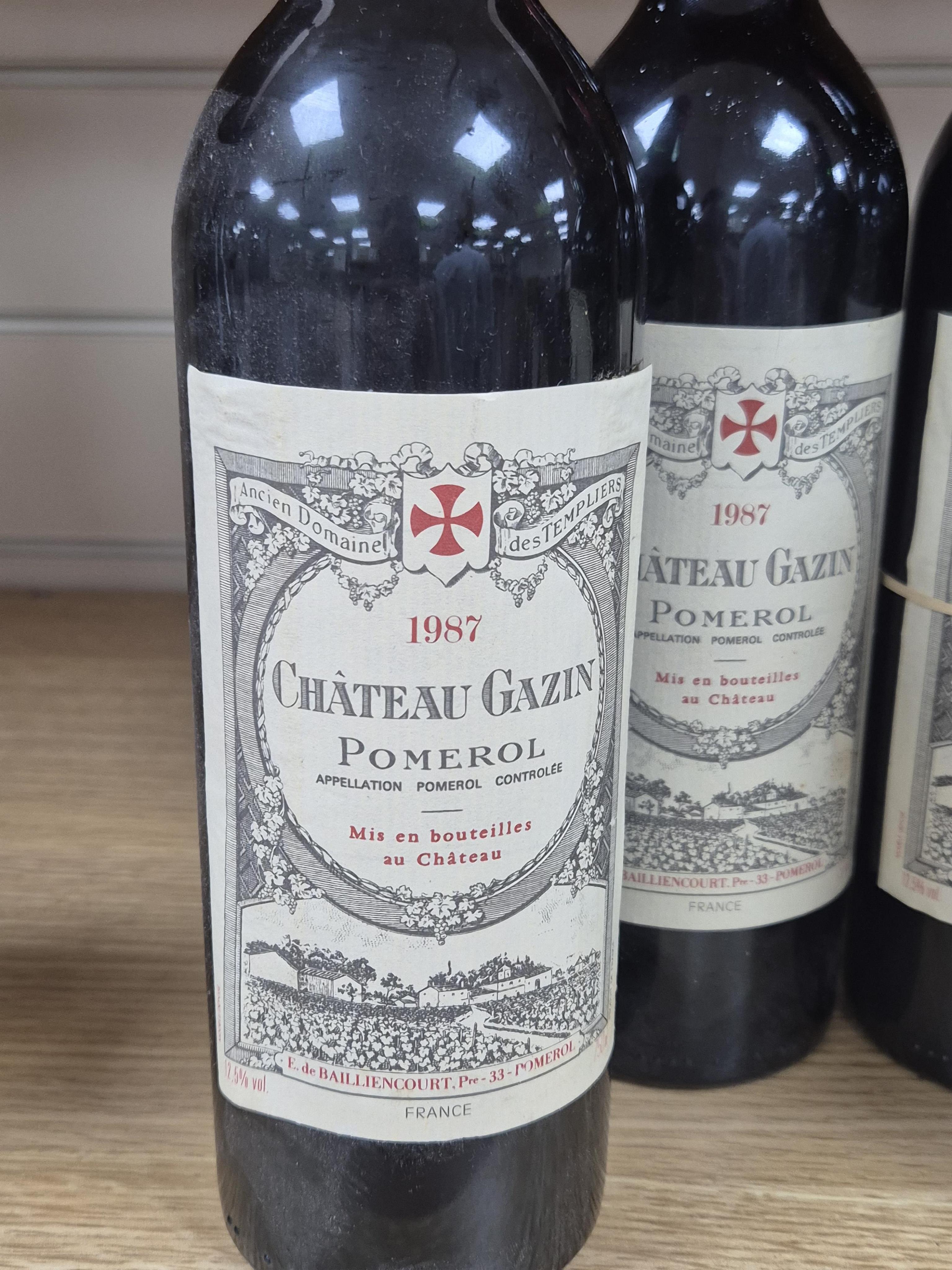 Four Bottles of Bordeaux red wine comprising three bottles of Château Gazin Pomerol, 1987, plus a Château Beaumont Haut-Medoc, 2005